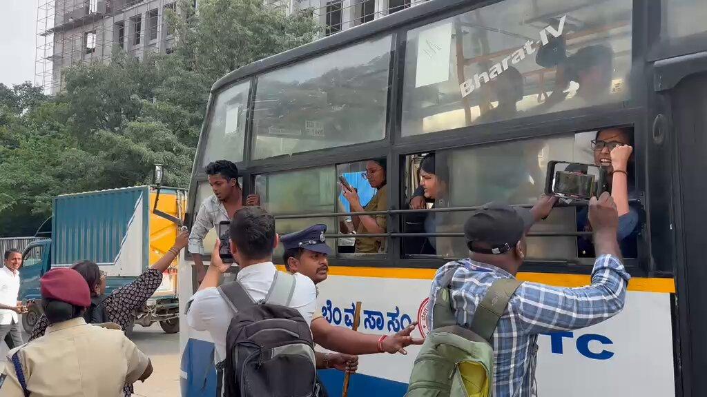 RT by @wonderingsher: Activists from various groups being detained and taken away in buses by police during a protest near KR circle, demanding the resignation of Chief Election Commissione