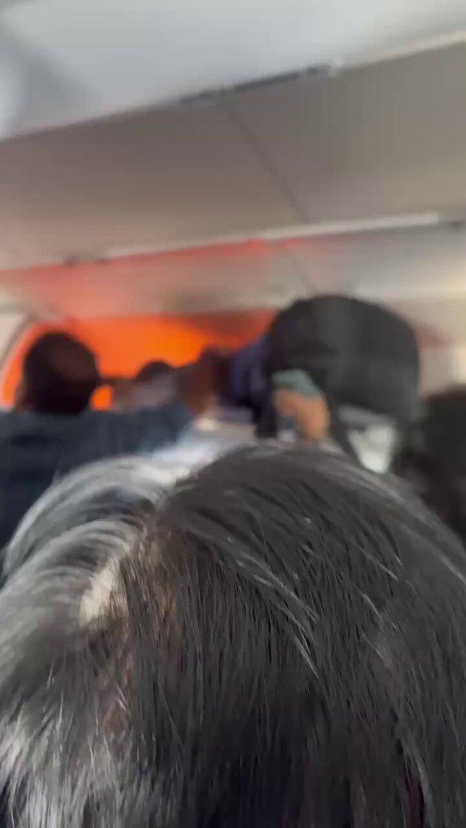 flight made an emergency landing at airport, following a fire incident inside the cabin reportedly caused by a passenger’s power bank. The incident triggered alarm among passengers,