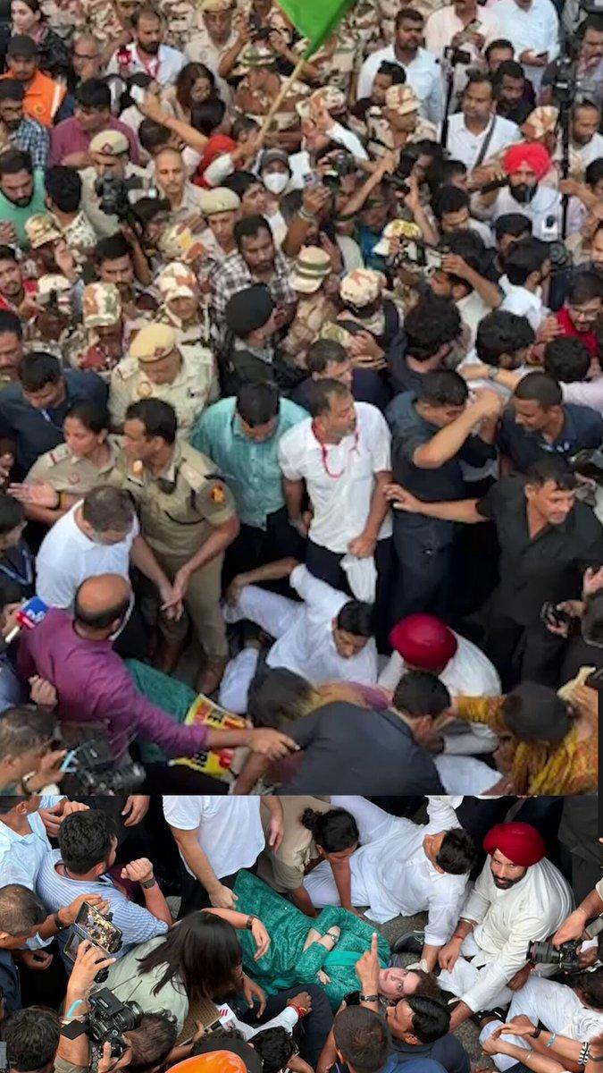 Congress MP Priyanka Gandhi Vadra lay on the road holding a copy of the Constitution as high drama being played out on Delhi streets #