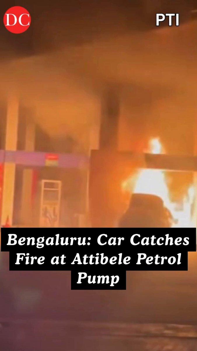 A car caught fire at a petrol pump in Attibele, Bengaluru, triggering panic at the fuel station. Firefighters were rushed to the spot to control the blaze. (Video:PTI)
