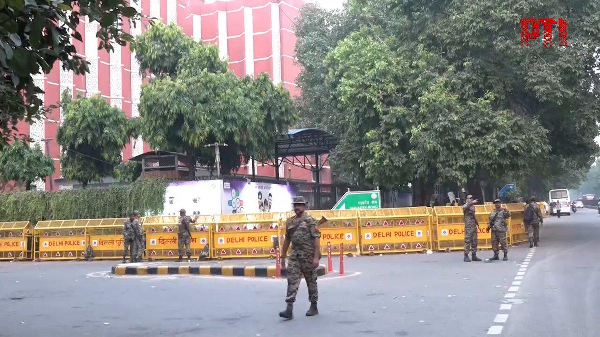 Look at how the Election Commission building is covered with barricades and security forces.