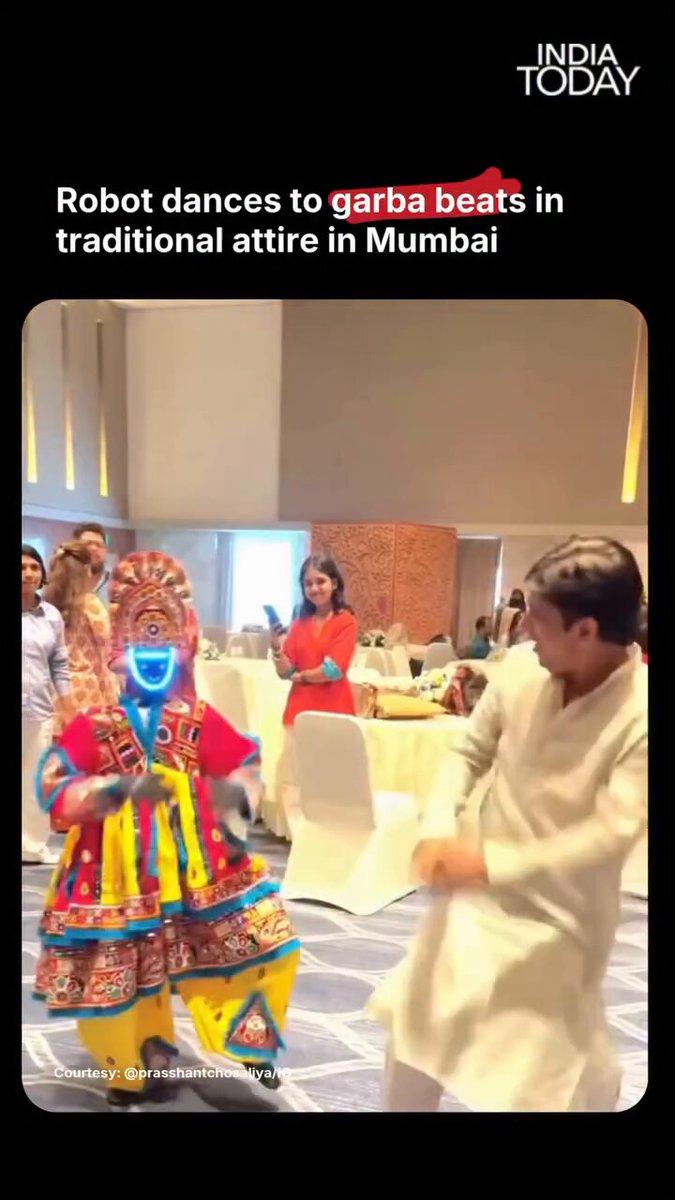 A video from Mumbai shows a garba coach dancing alongside a small robot dressed in traditional attire, with the robot matching the festive mood with its own moves. Video: Prashant Chosaliya/IG