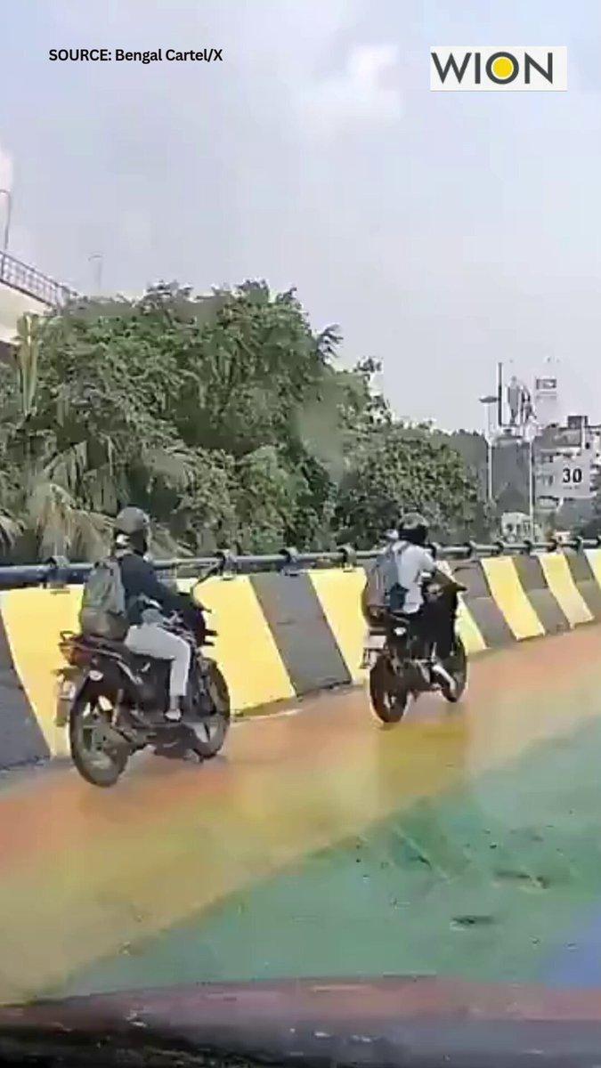 RT by @IndianTrainFan: Kolkata flyover turns slippery after rain, bikers skid on freshly coloured road #India #WestBengal #Kolkata #roads #wion