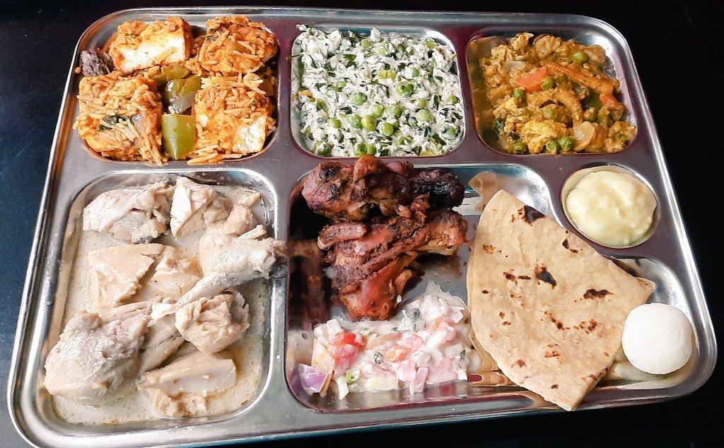 From my Foodie Album Dinner Feast (clockwise from top left) Paneer Tikka Pulao + Malai Methi Mutter + Mixed Vegetables Handi + Shrikhand + Roshogulla + Chapati + Raita + Tandoori Ch